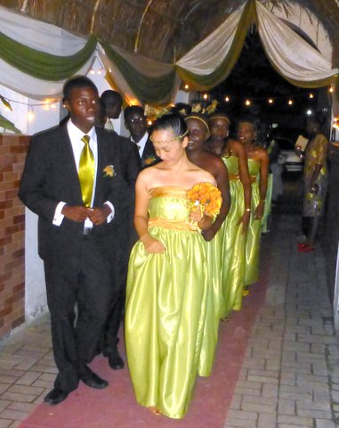 The Bridesmaids and their escorts dance into the celebration hall